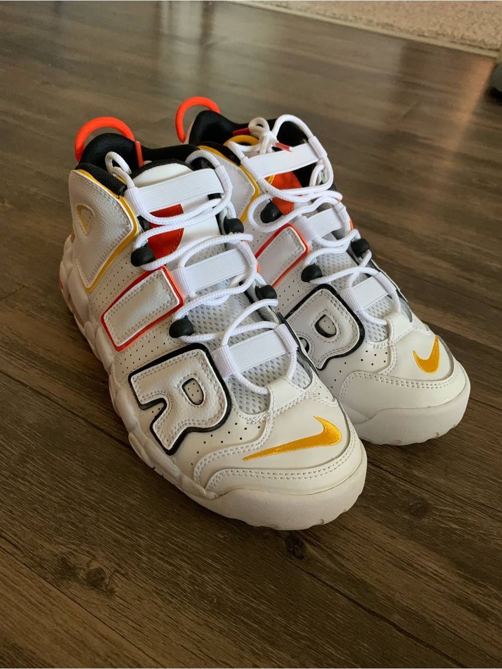 Nike Kids White Sneakers with Yellow & Orange Accents